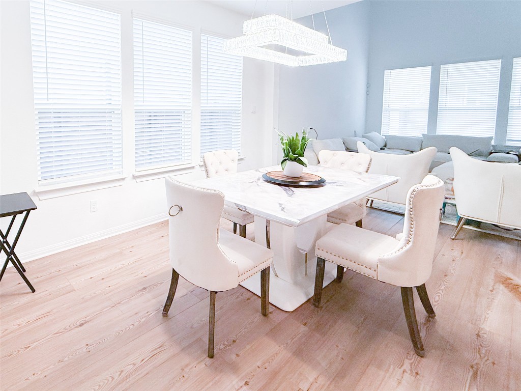 253 Inlet Lane Leander, TX 78641 - Photo 4 of 23 Dining space with light wood-type flooring