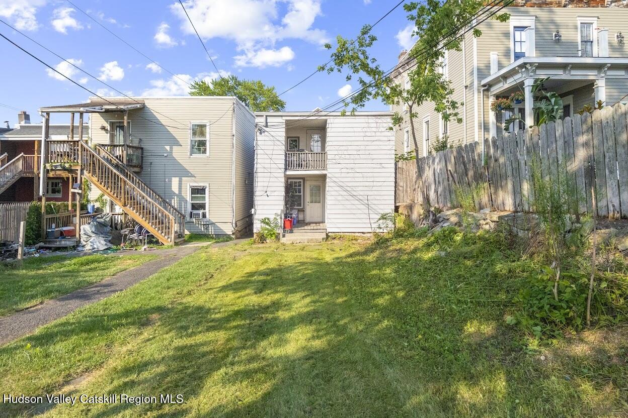 543 State Street, Unit 2 Hudson, NY 12534 - Photo 15 of 22 a view of a house with a yard and sitting area