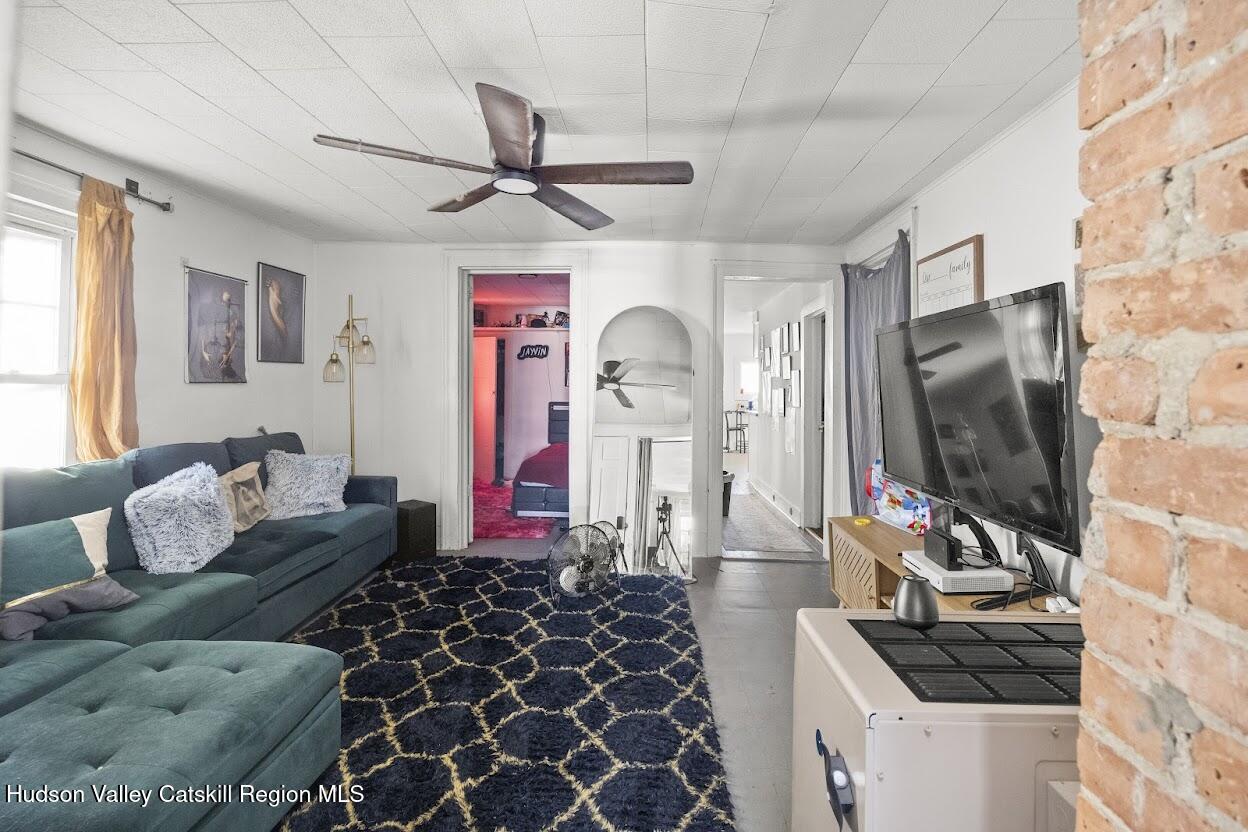 543 State Street, Unit 2 Hudson, NY 12534 - Photo 5 of 22 a living room with furniture and a flat screen tv