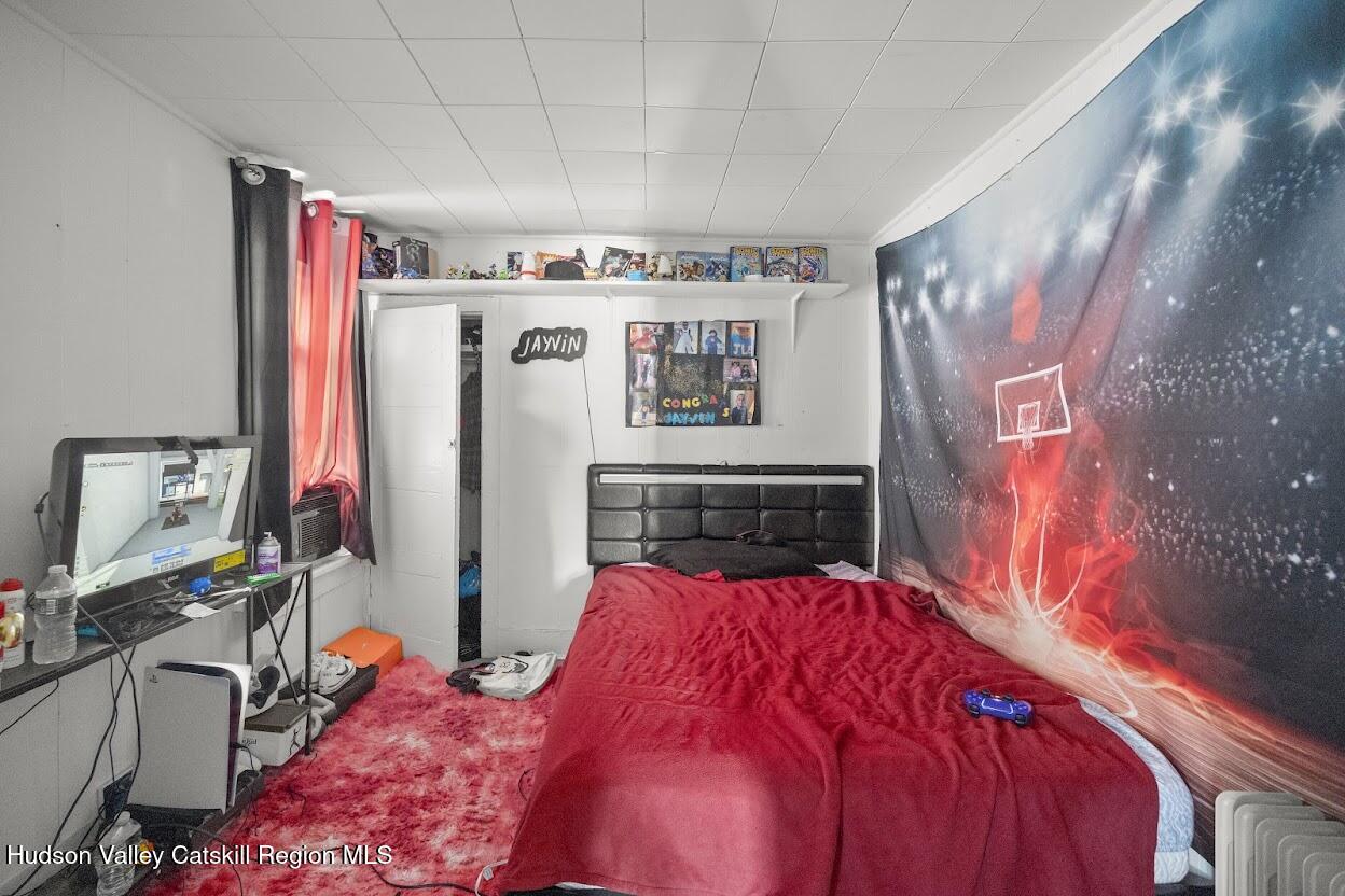 543 State Street, Unit 2 Hudson, NY 12534 - Photo 9 of 22 a view of walk in closet with clothes and shoes