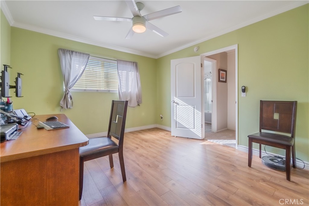 630 South Knott, Unit 14 Anaheim, CA 92804 - Photo 17 of 26 a living room with furniture and a wooden floor