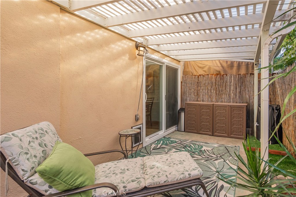 630 South Knott, Unit 14 Anaheim, CA 92804 - Photo 20 of 26 a bedroom with a bed and a flat screen tv