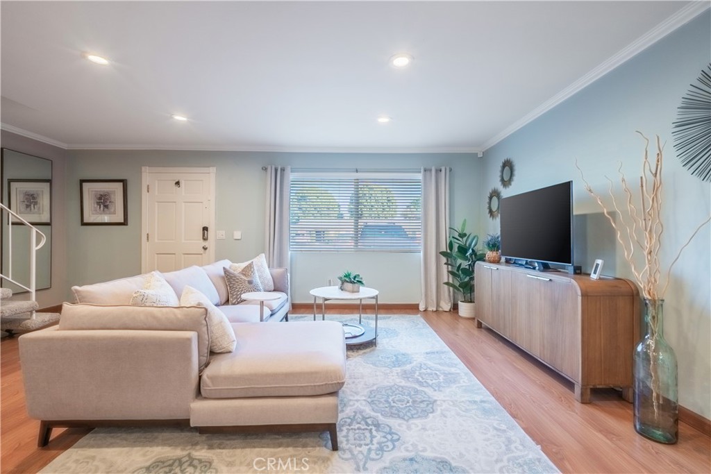 630 South Knott, Unit 14 Anaheim, CA 92804 - Photo 4 of 26 a living room with furniture and a flat screen tv