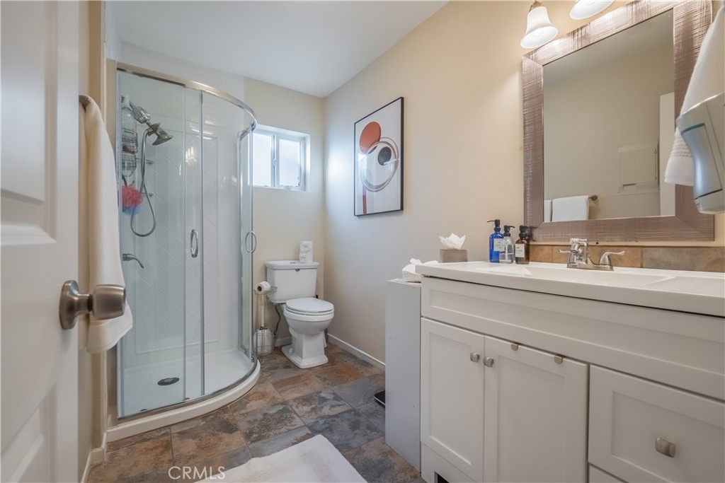 630 South Knott, Unit 14 Anaheim, CA 92804 - Photo 10 of 26 a bathroom with a toilet sink and shower