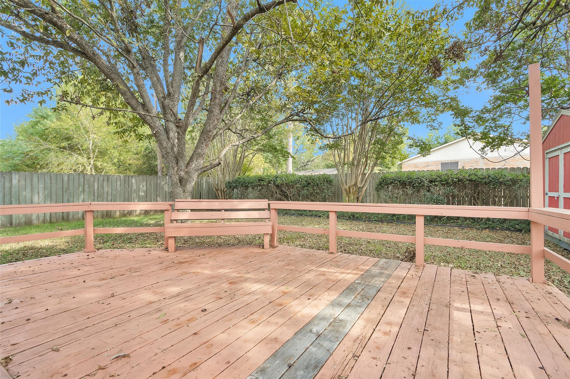 1706 Shawnee Street Navasota, TX 77868 - Photo 25 of 29 a view of backyard with wooden floor and fence
