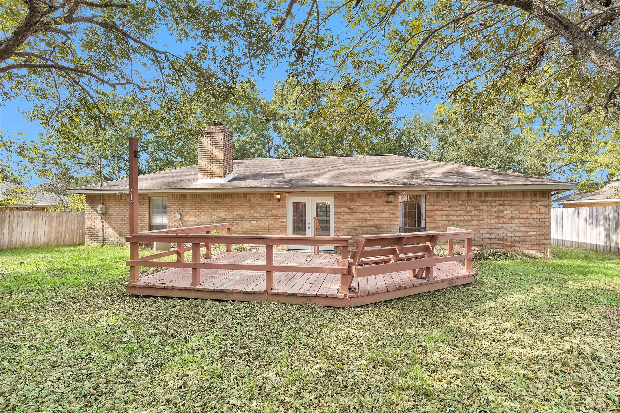 1706 Shawnee Street Navasota, TX 77868 - Photo 26 of 29 front view of a house with a yard