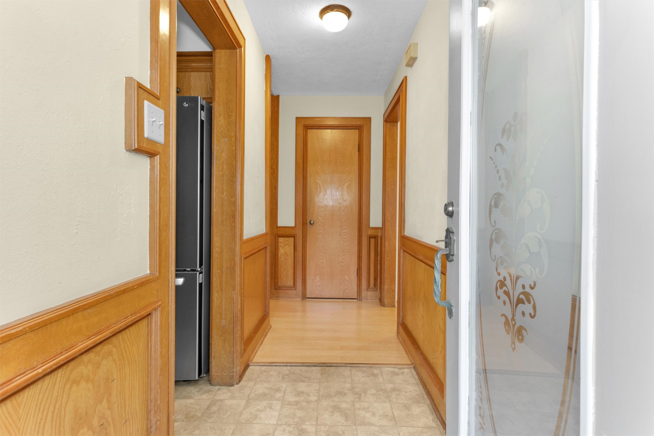 1706 Shawnee Street Navasota, TX 77868 - Photo 5 of 29 a view of a hallway with wooden floor and staircase