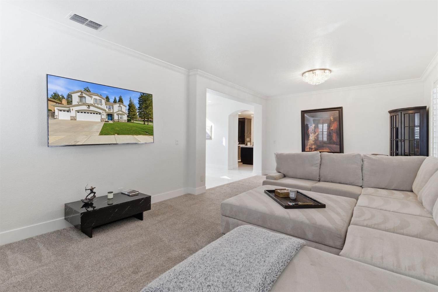 243 John Kamps Way Ripon, CA 95366 - Photo 16 of 62 a living room with furniture and a couch
