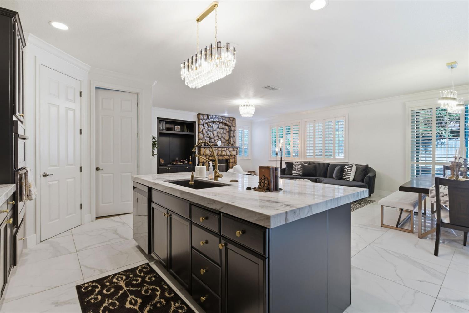 243 John Kamps Way Ripon, CA 95366 - Photo 20 of 62 a kitchen with a counter space appliances and a view of dining room