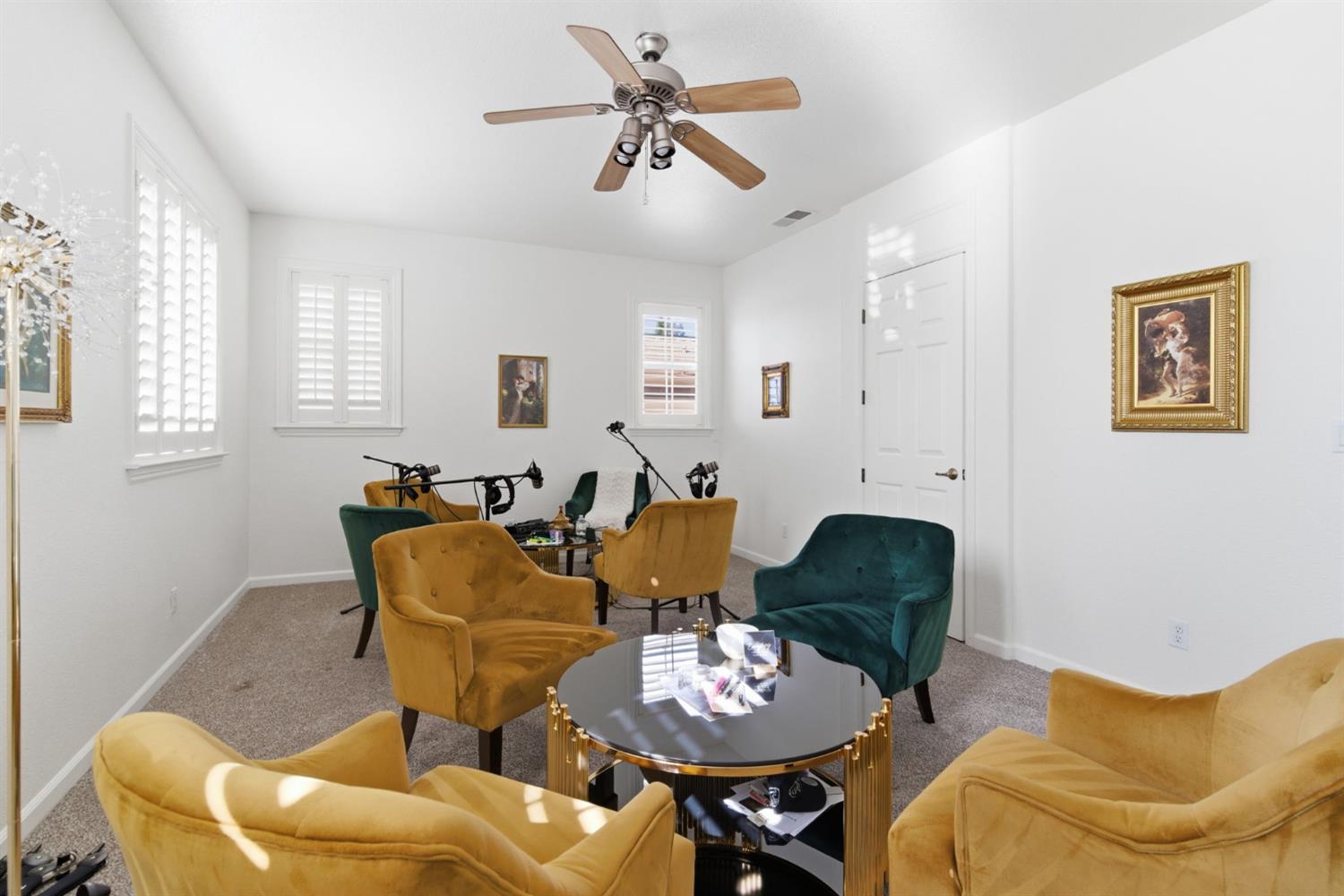 243 John Kamps Way Ripon, CA 95366 - Photo 35 of 62 a living room with furniture a chandelier and a window