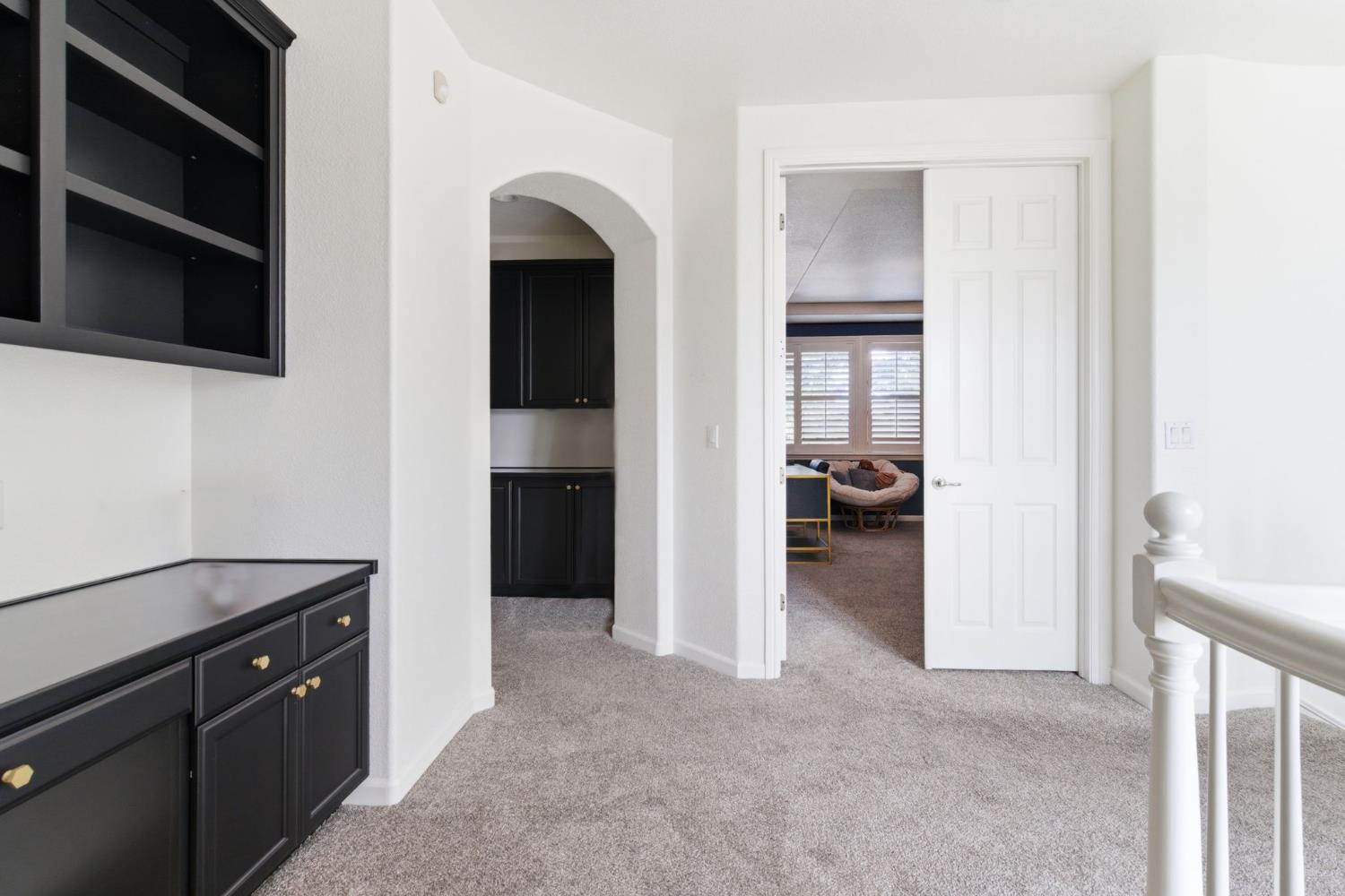 243 John Kamps Way Ripon, CA 95366 - Photo 41 of 62 a view of hallway with livingroom and a window