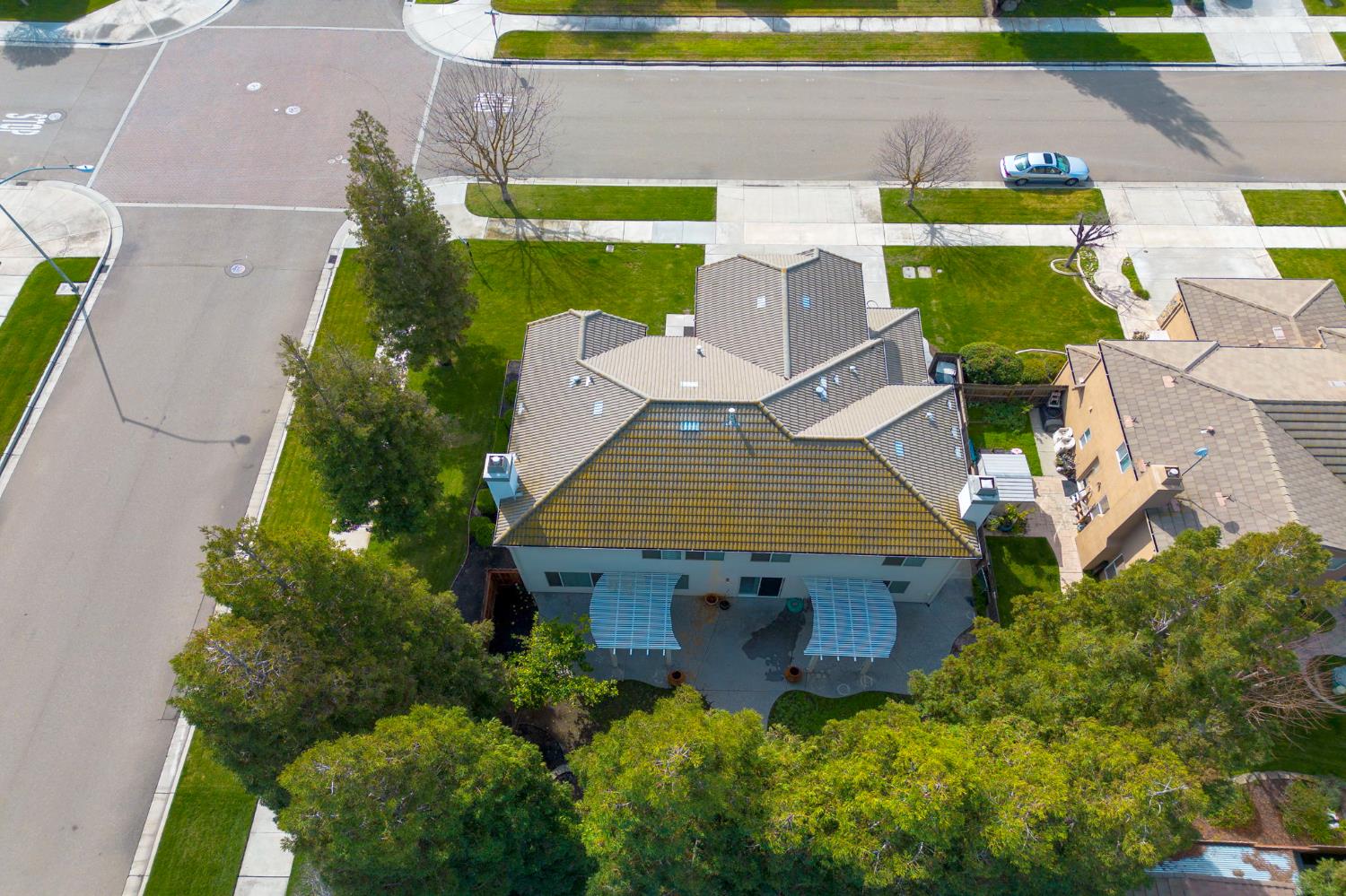 243 John Kamps Way Ripon, CA 95366 - Photo 54 of 62 an aerial view of a house with a garden