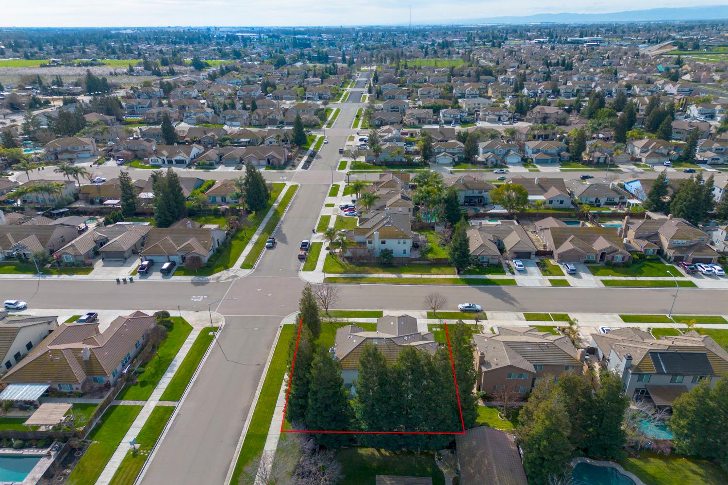 243 John Kamps Way Ripon, CA 95366 - Photo 58 of 62 an aerial view of residential houses with outdoor space and swimming pool