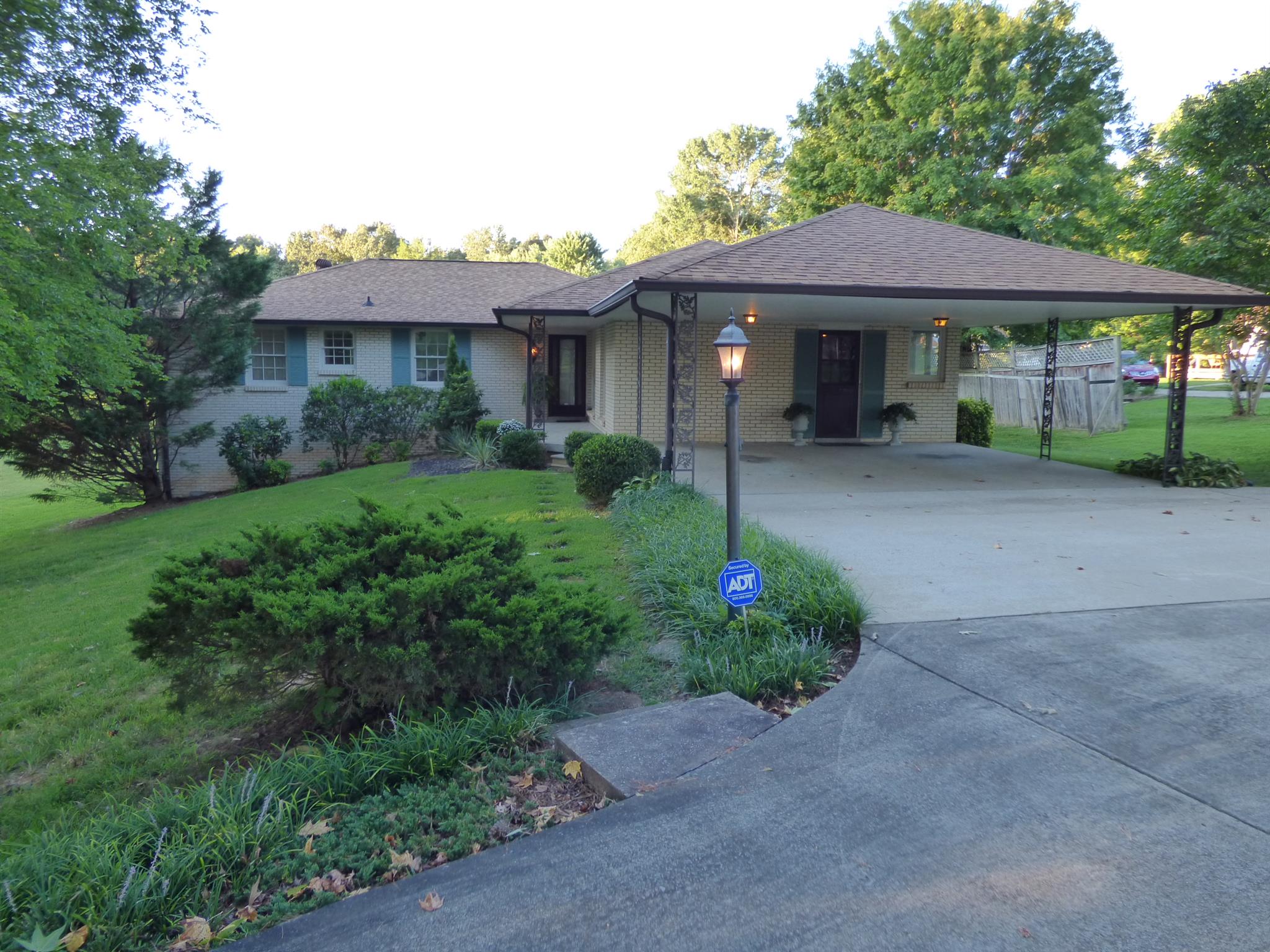 441 Excell Road Clarksville, TN 37043 - Photo 1 of 30 a front view of a house with garden