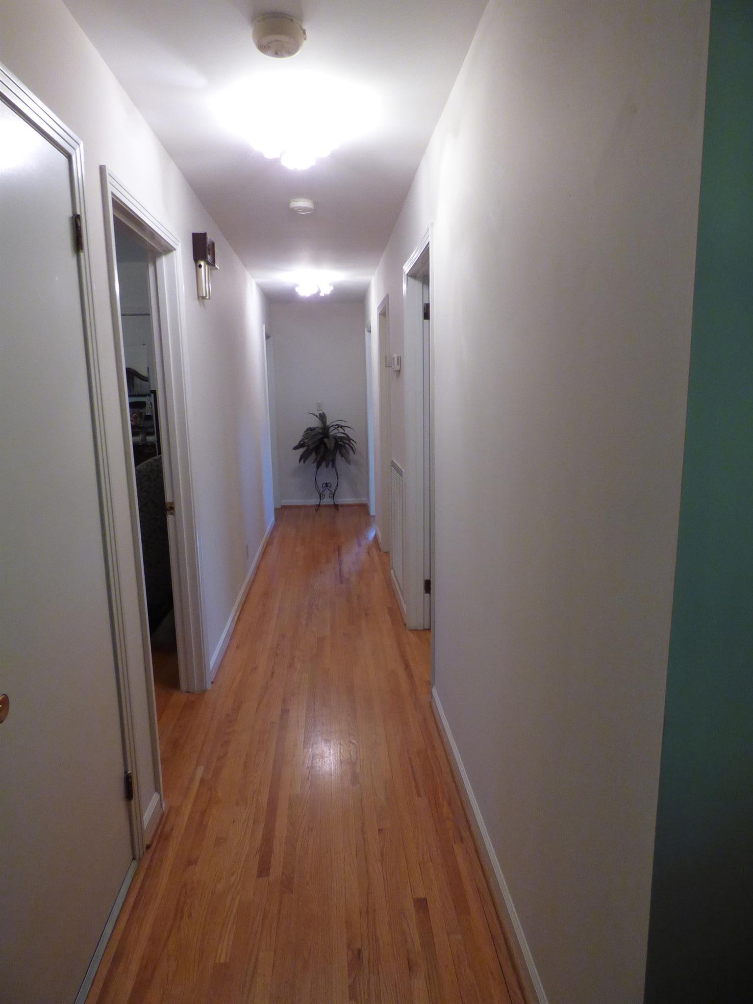 441 Excell Road Clarksville, TN 37043 - Photo 12 of 30 a view of hallway with wooden floor
