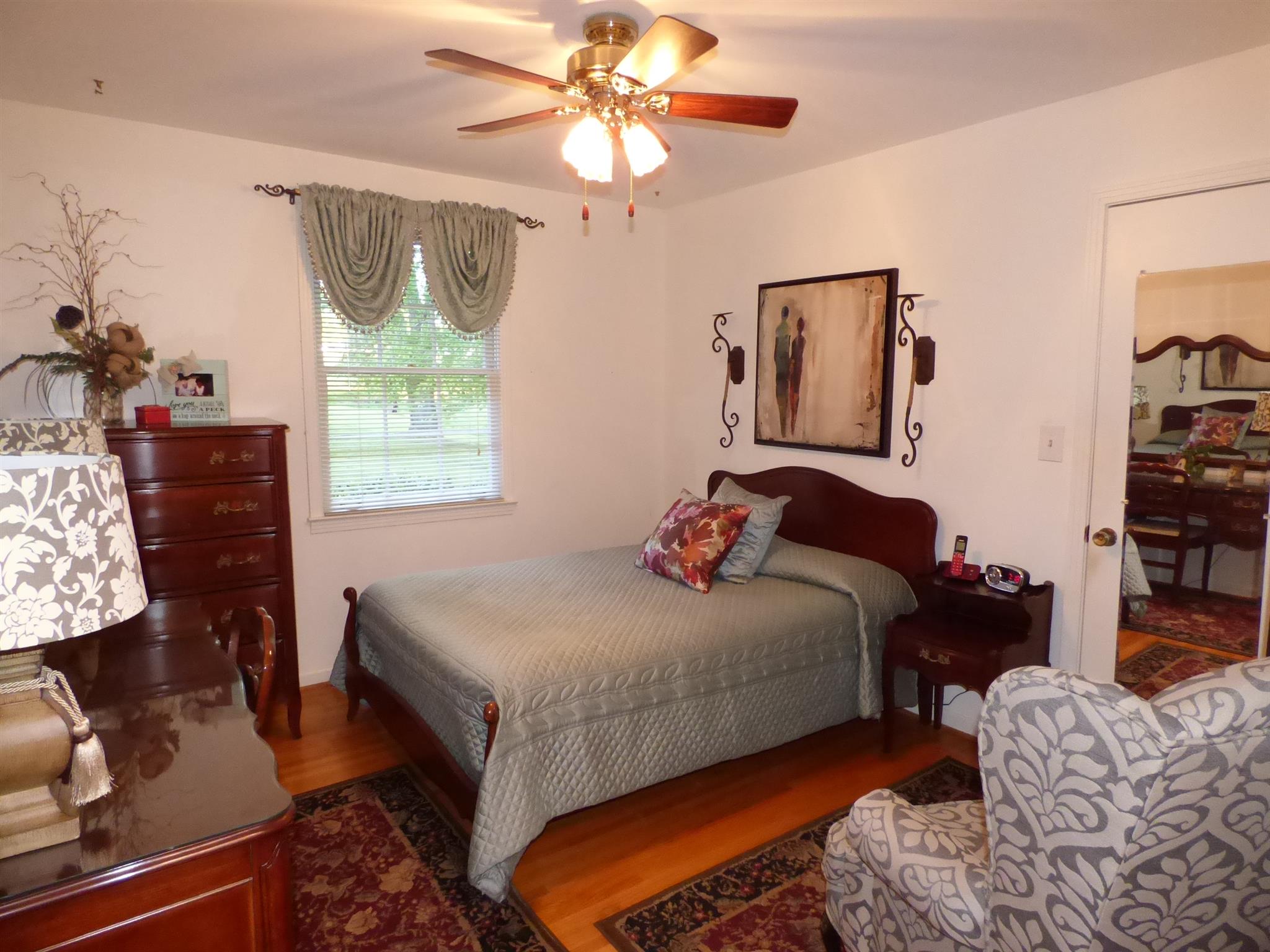 441 Excell Road Clarksville, TN 37043 - Photo 13 of 30 a bedroom with bed and window