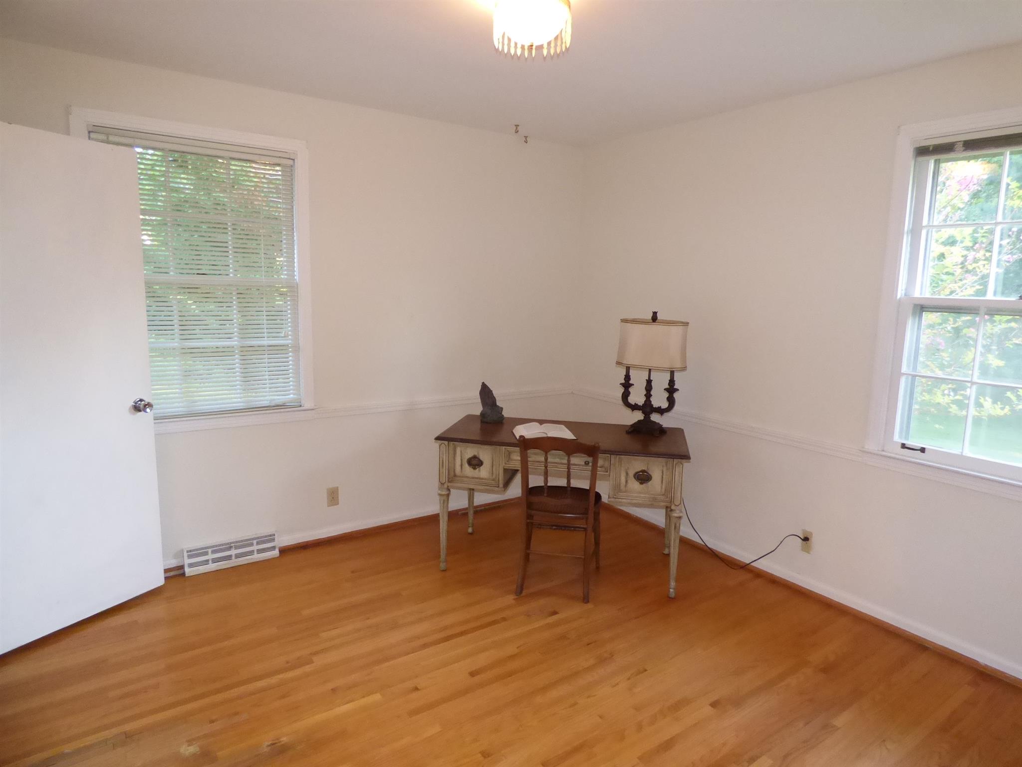441 Excell Road Clarksville, TN 37043 - Photo 19 of 30 a view of a workspace with furniture and a window