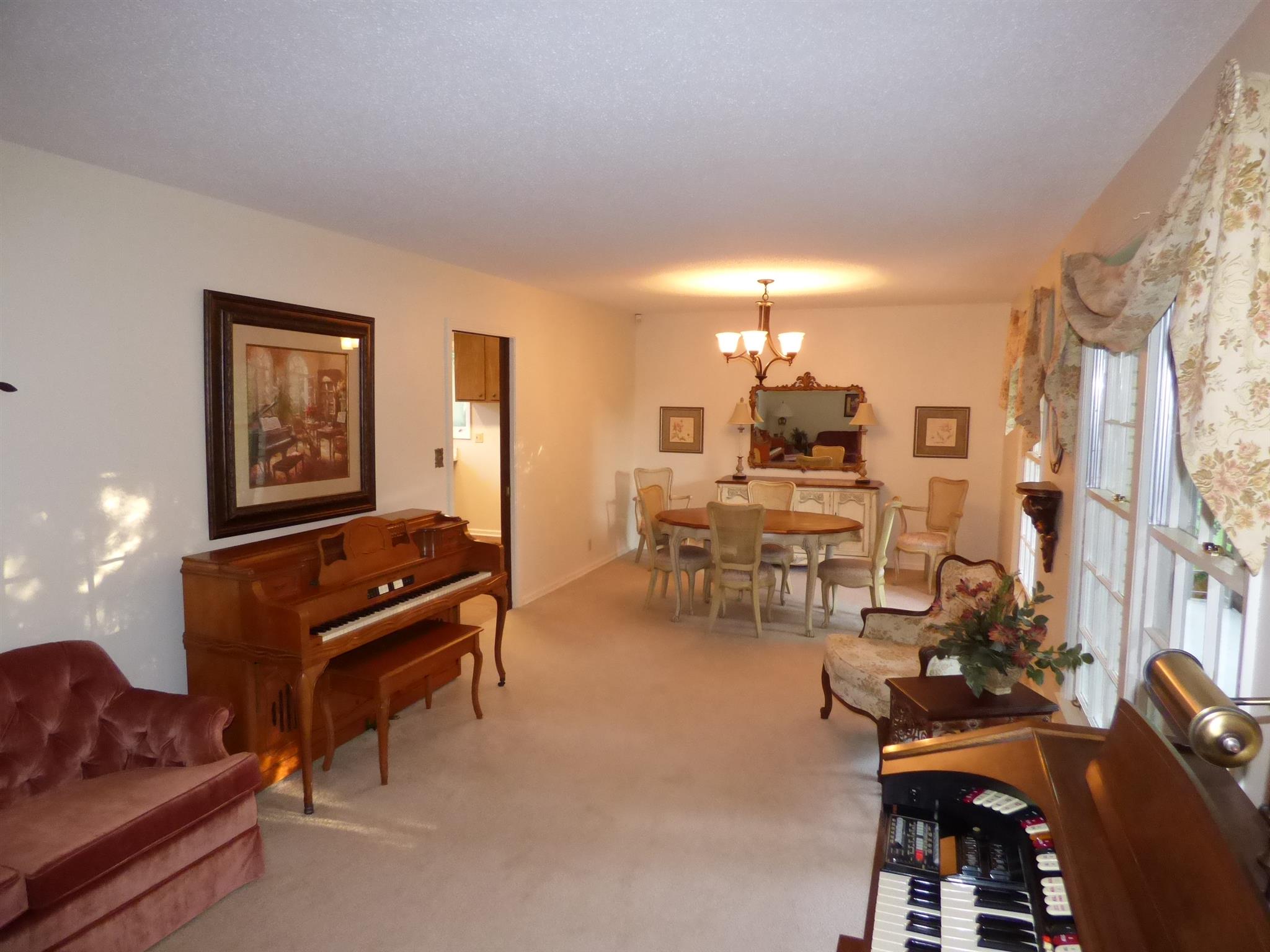 441 Excell Road Clarksville, TN 37043 - Photo 3 of 30 a living room with furniture and wooden floor