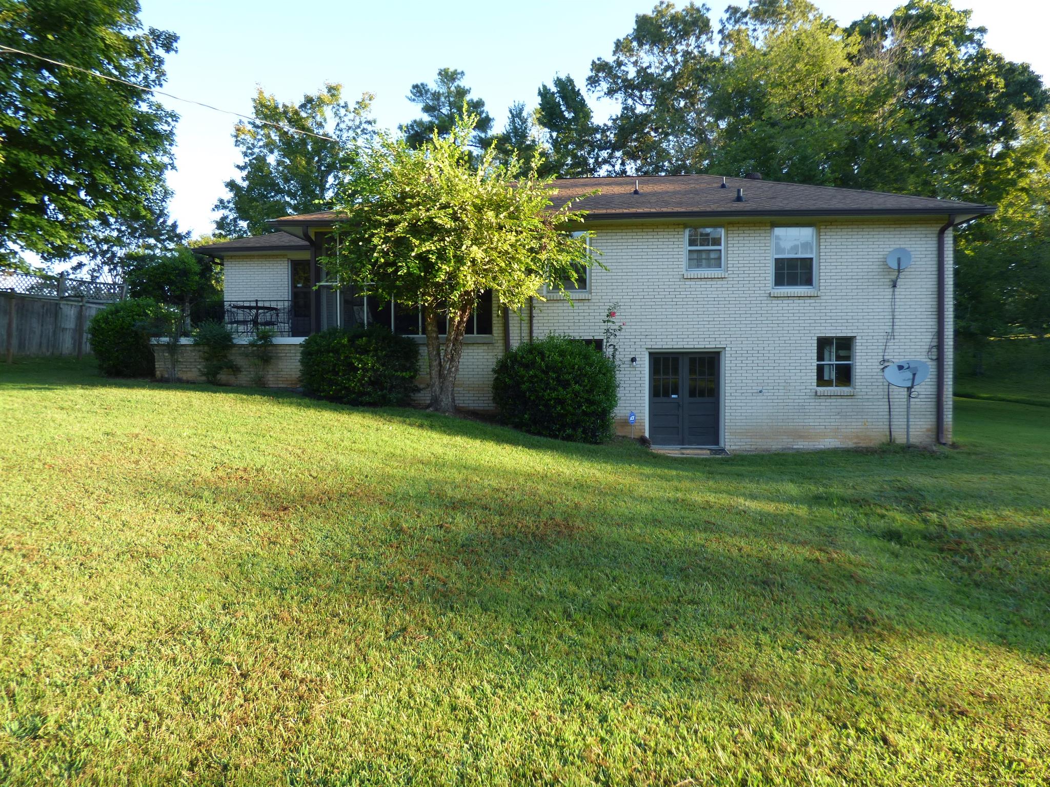 441 Excell Road Clarksville, TN 37043 - Photo 29 of 30 a view of a house with a yard and a garage