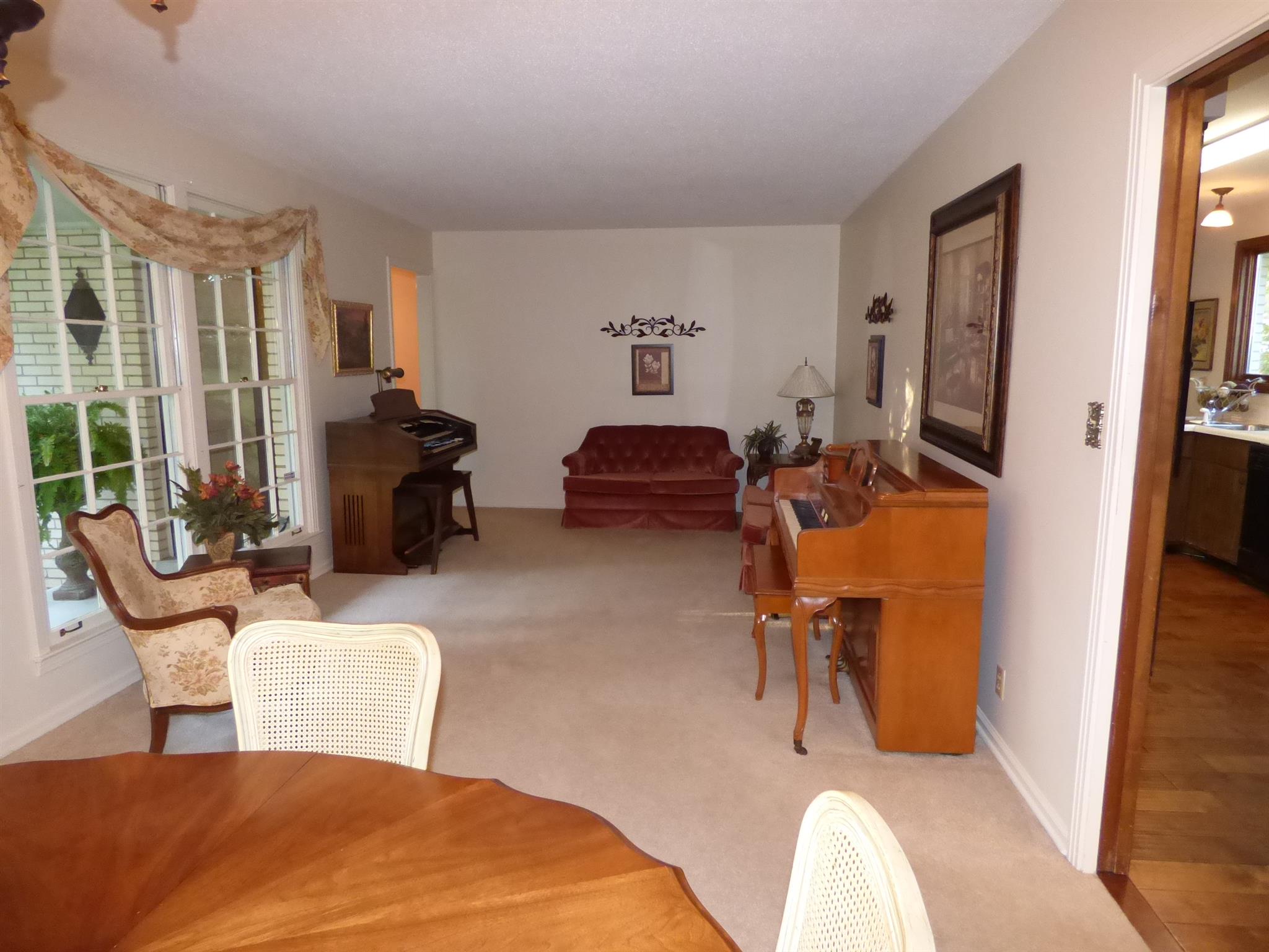 441 Excell Road Clarksville, TN 37043 - Photo 4 of 30 a bedroom with furniture and a window