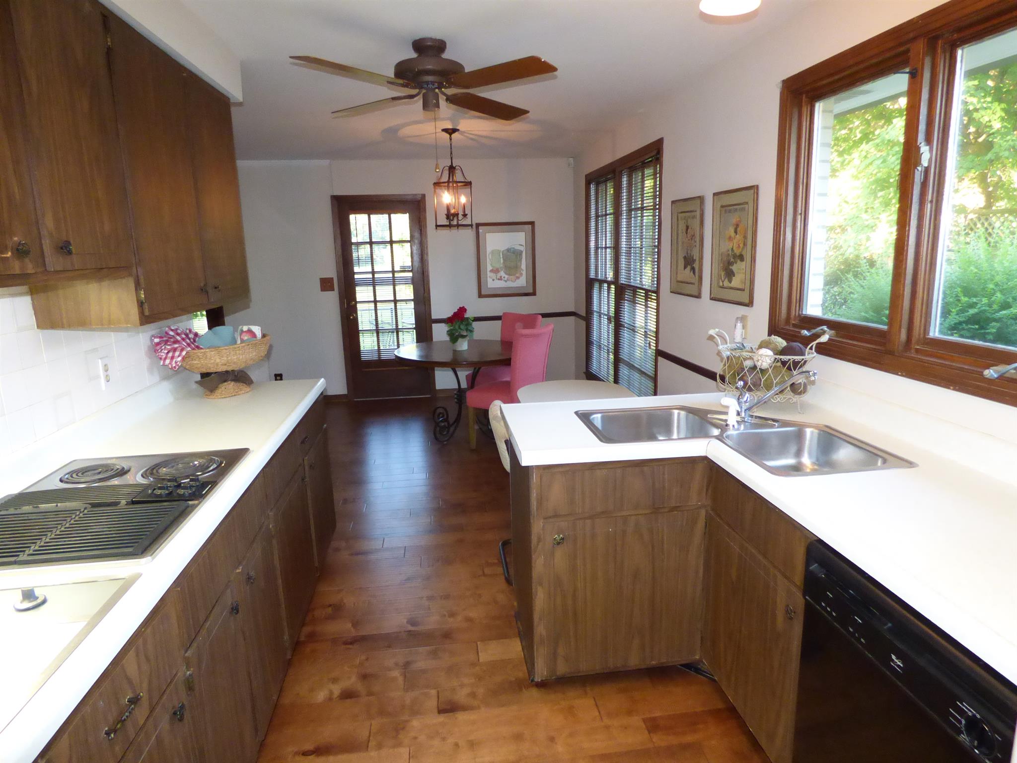 441 Excell Road Clarksville, TN 37043 - Photo 8 of 30 a kitchen with kitchen island granite countertop a sink stove and cabinets