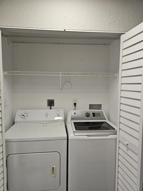 1102 Jeffery Street Boca Raton, FL 33487 - Photo 14 of 14 a utility room with dryer and washer