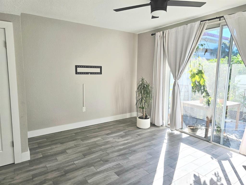 1102 Jeffery Street Boca Raton, FL 33487 - Photo 6 of 14 a view of an empty room with a window