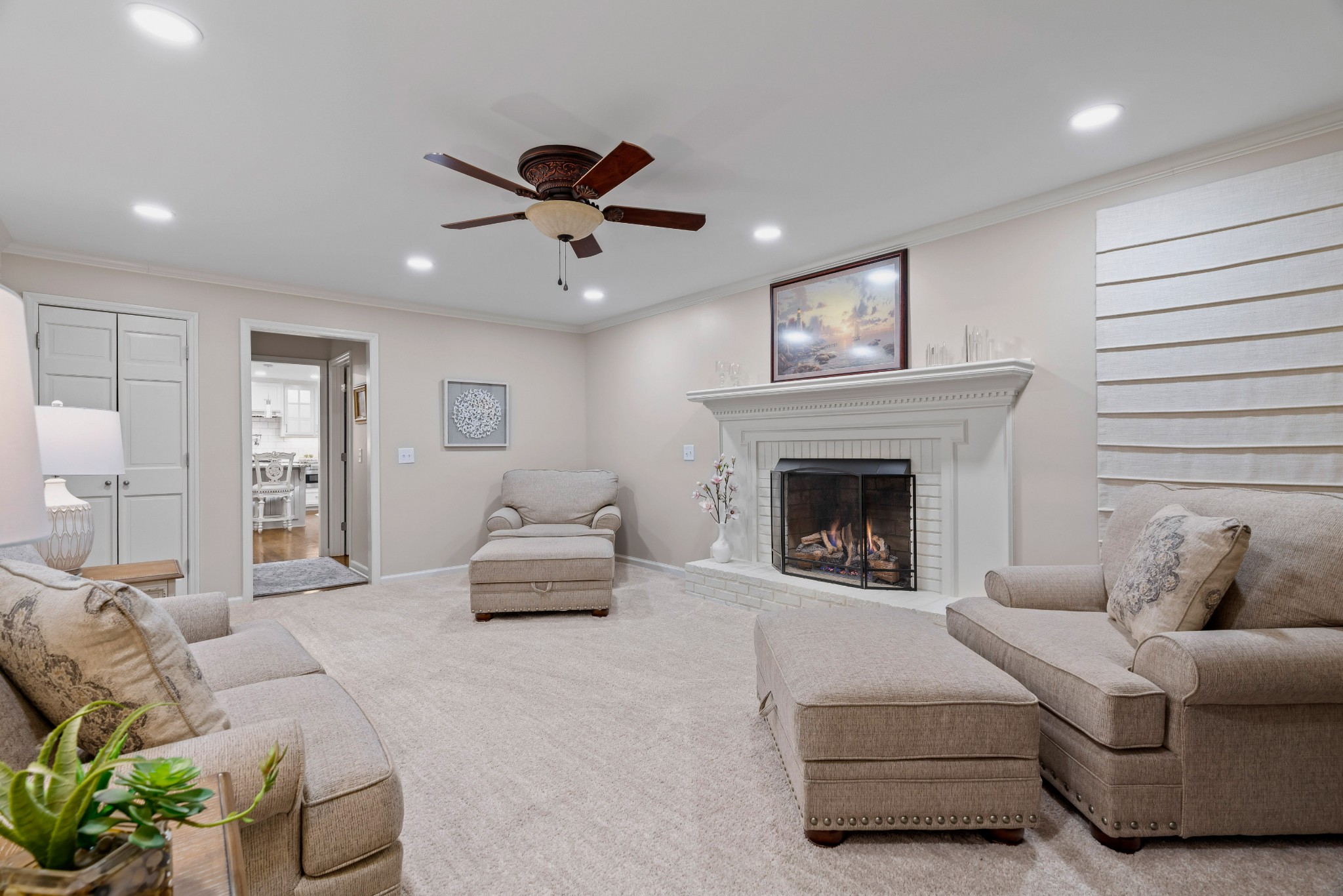 204 Hidden Lake Road Hendersonville, TN 37075 - Photo 19 of 67 a living room with furniture and a fireplace