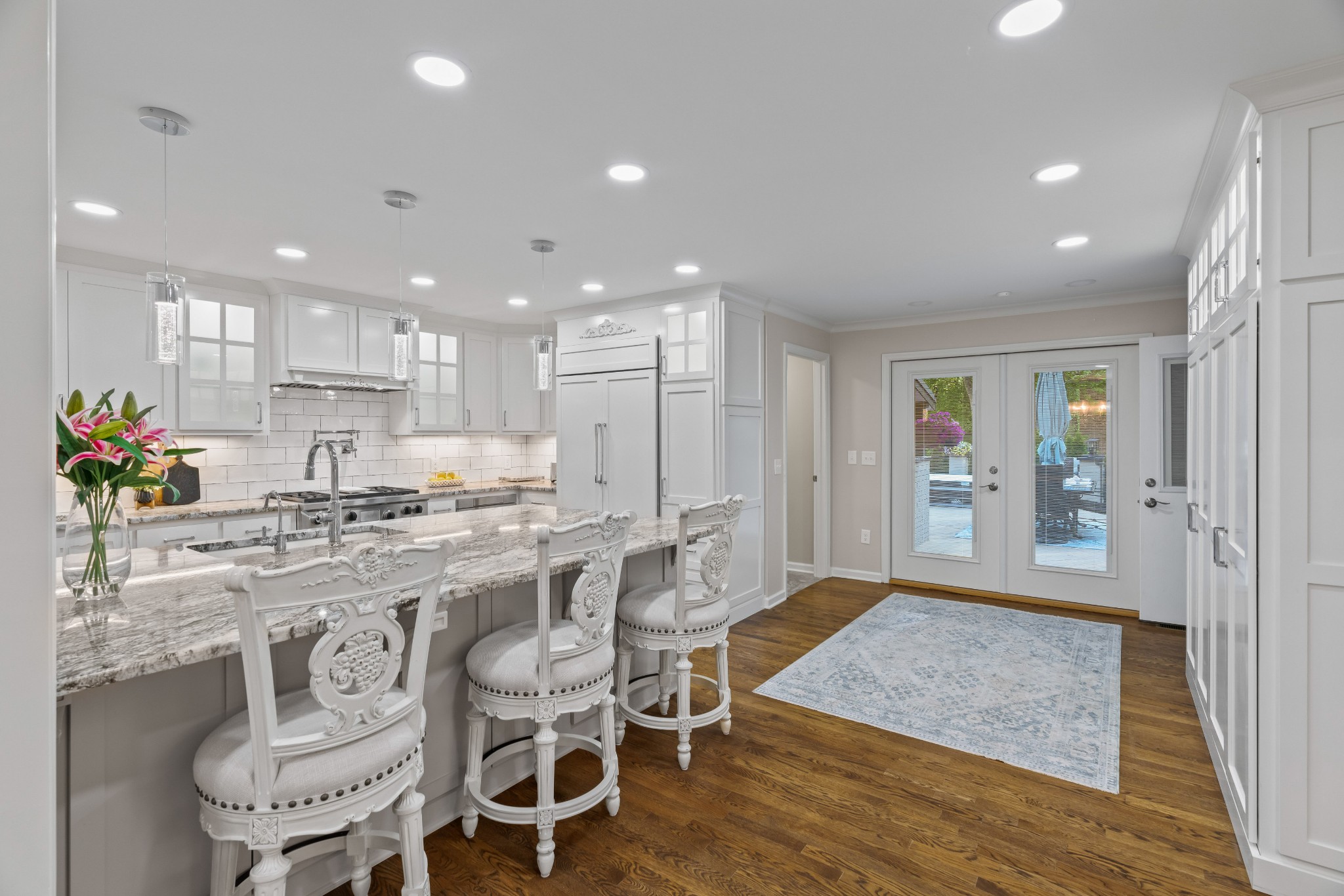 204 Hidden Lake Road Hendersonville, TN 37075 - Photo 27 of 67 a large kitchen with a table and chairs