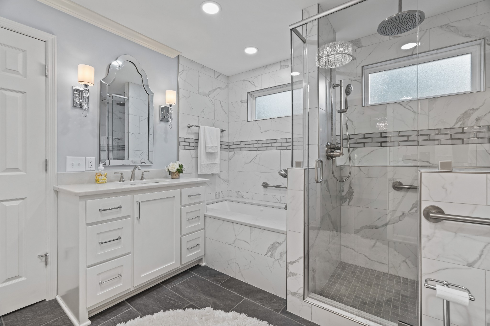 204 Hidden Lake Road Hendersonville, TN 37075 - Photo 39 of 67 a bathroom with a shower sink and mirror