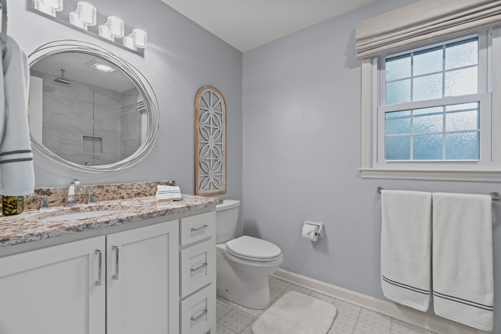 204 Hidden Lake Road Hendersonville, TN 37075 - Photo 44 of 67 a bathroom with a granite countertop toilet a sink and a mirror