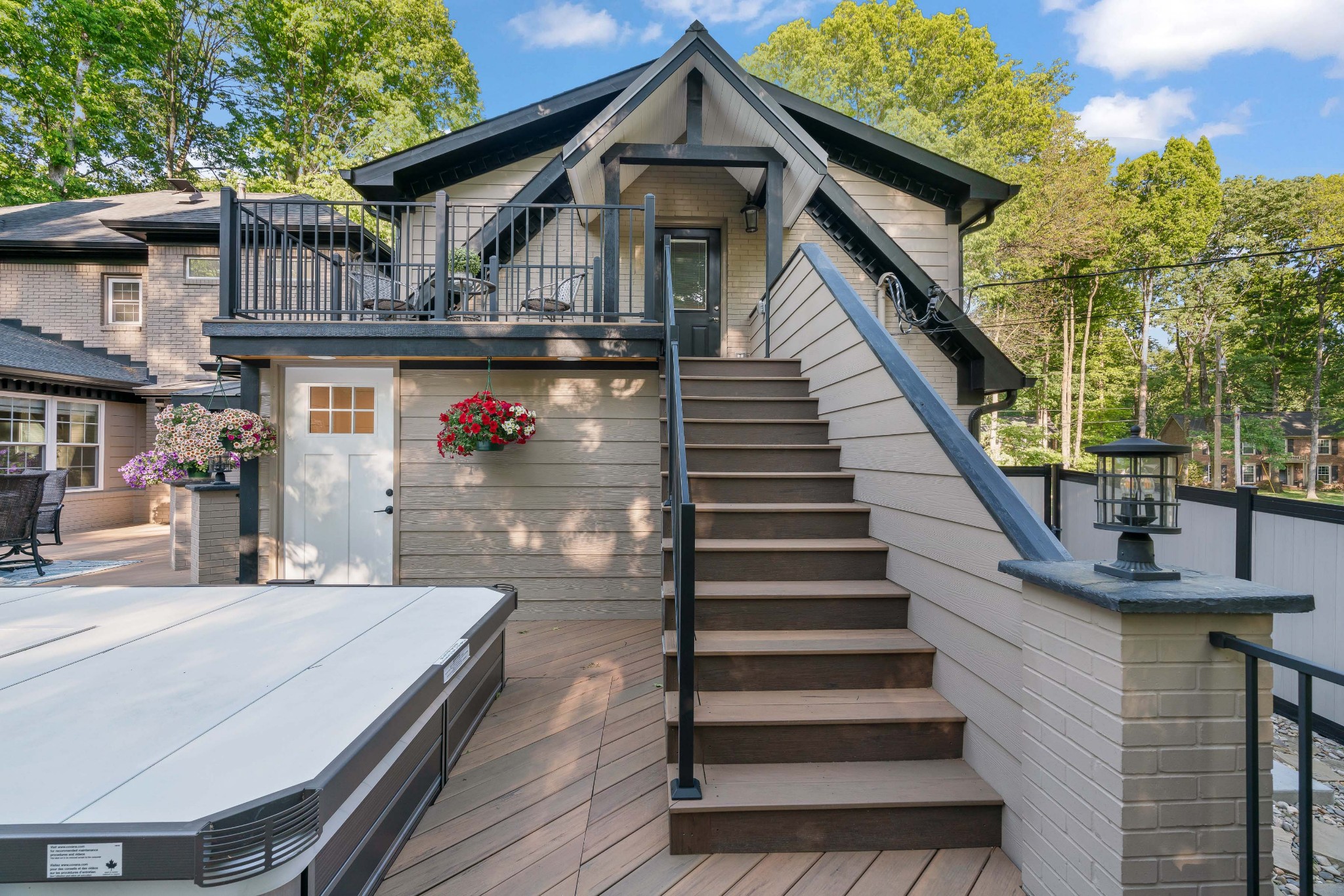 204 Hidden Lake Road Hendersonville, TN 37075 - Photo 48 of 67 a front view of a house with wooden stairs and a bench