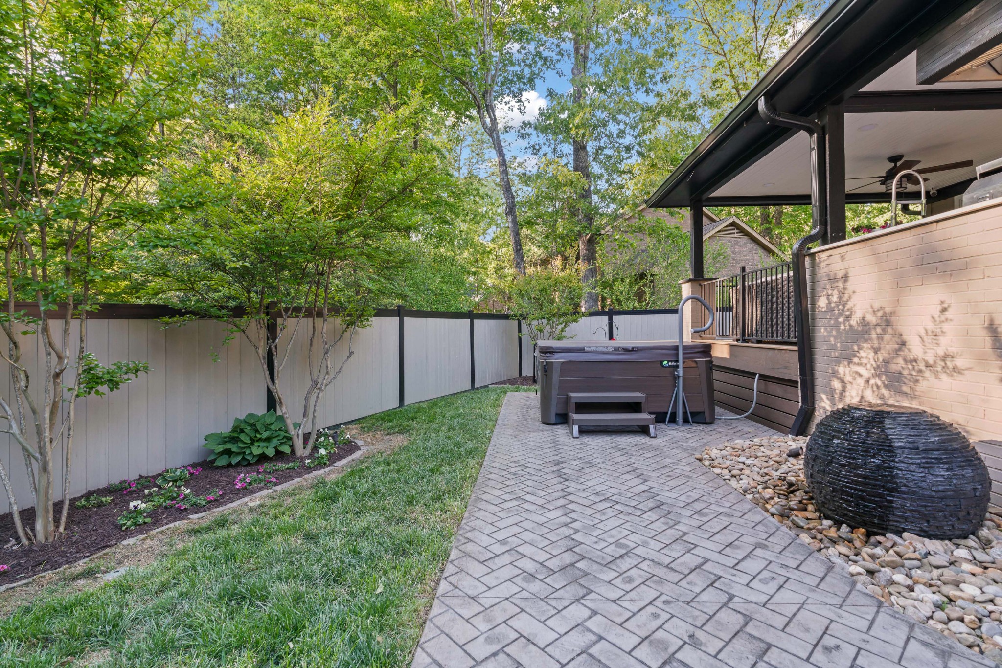 204 Hidden Lake Road Hendersonville, TN 37075 - Photo 64 of 67 a view of a backyard with a garden and furniture