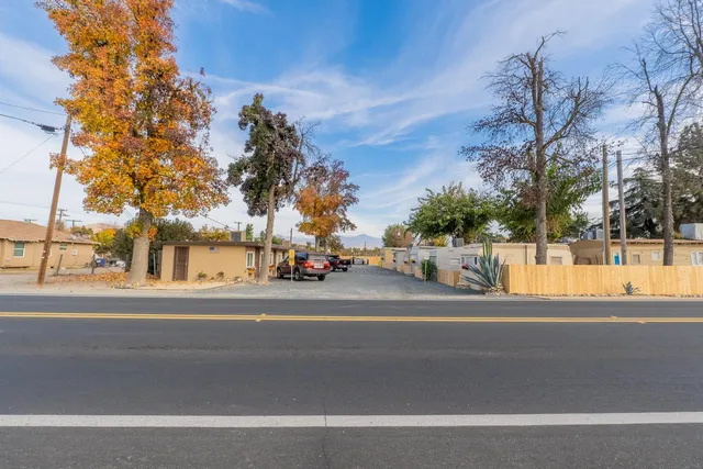 a view of a house with a back yard