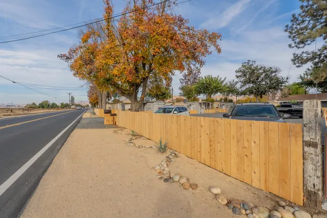 an aerial view of a house with a garden
