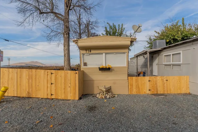 a view of a swimming pool with an outdoor seating