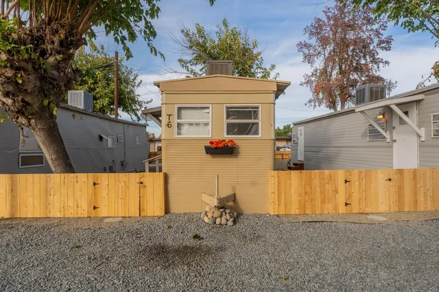 a view of house with yard