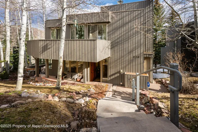 a front view of a house with street