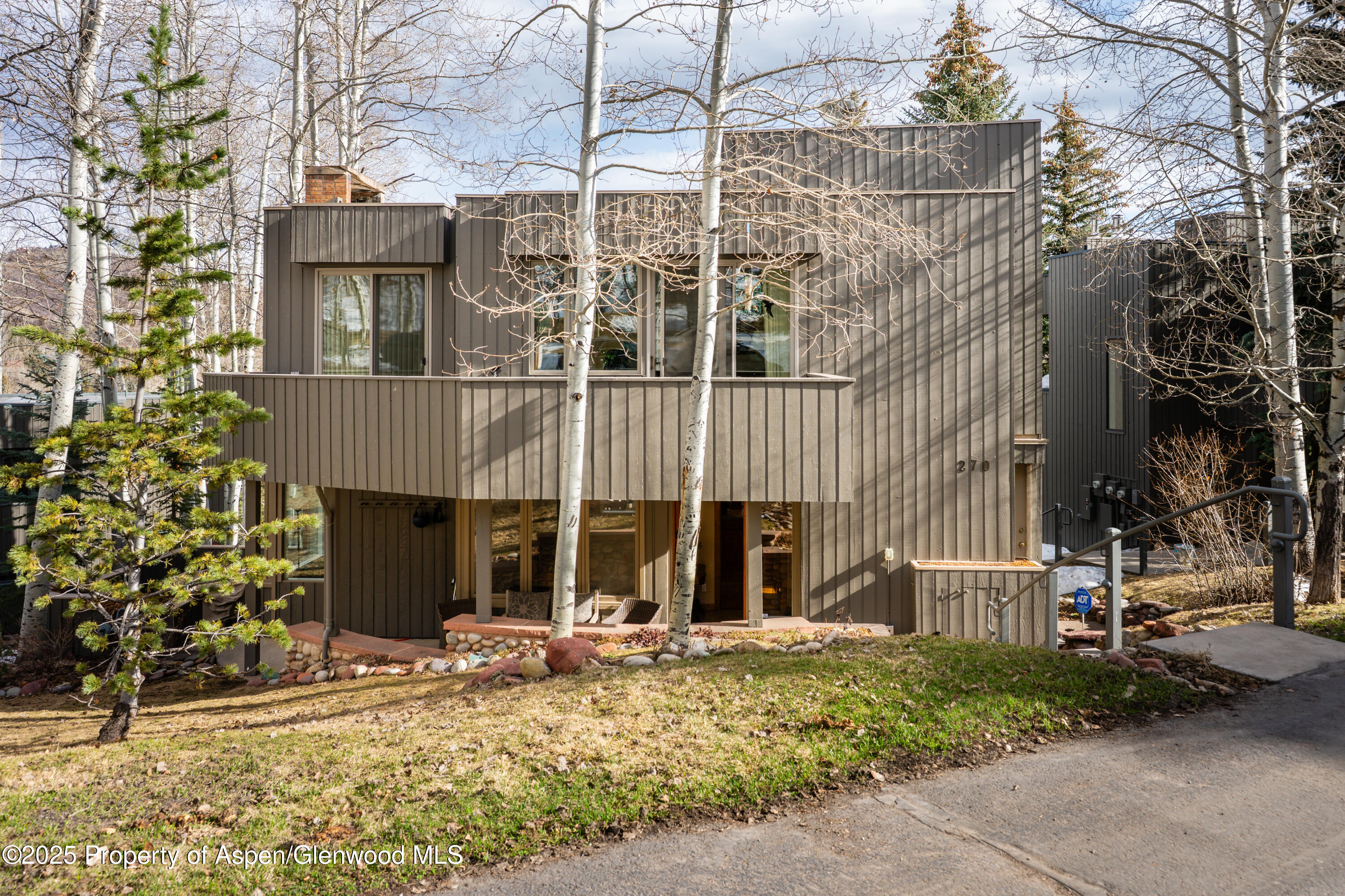 270 Meadow Ranch Road Snowmass Village, CO 81615 - Photo 17 of 17 front view of a building with a garden