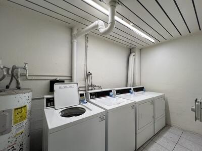 4215 North University Drive, Unit 214 Sunrise, FL 33351 - Photo 20 of 24 a room with storage and utility