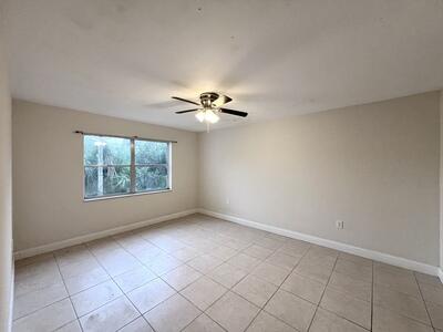 4215 North University Drive, Unit 214 Sunrise, FL 33351 - Photo 10 of 24 a view of an empty room with a window