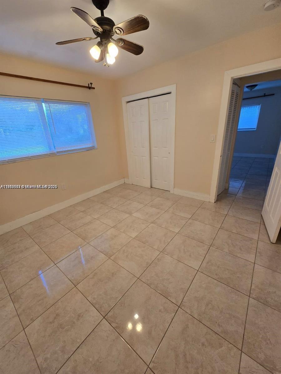 13455 Arch Creek Road North Miami, FL 33181 - Photo 5 of 5 a view of an empty room and window