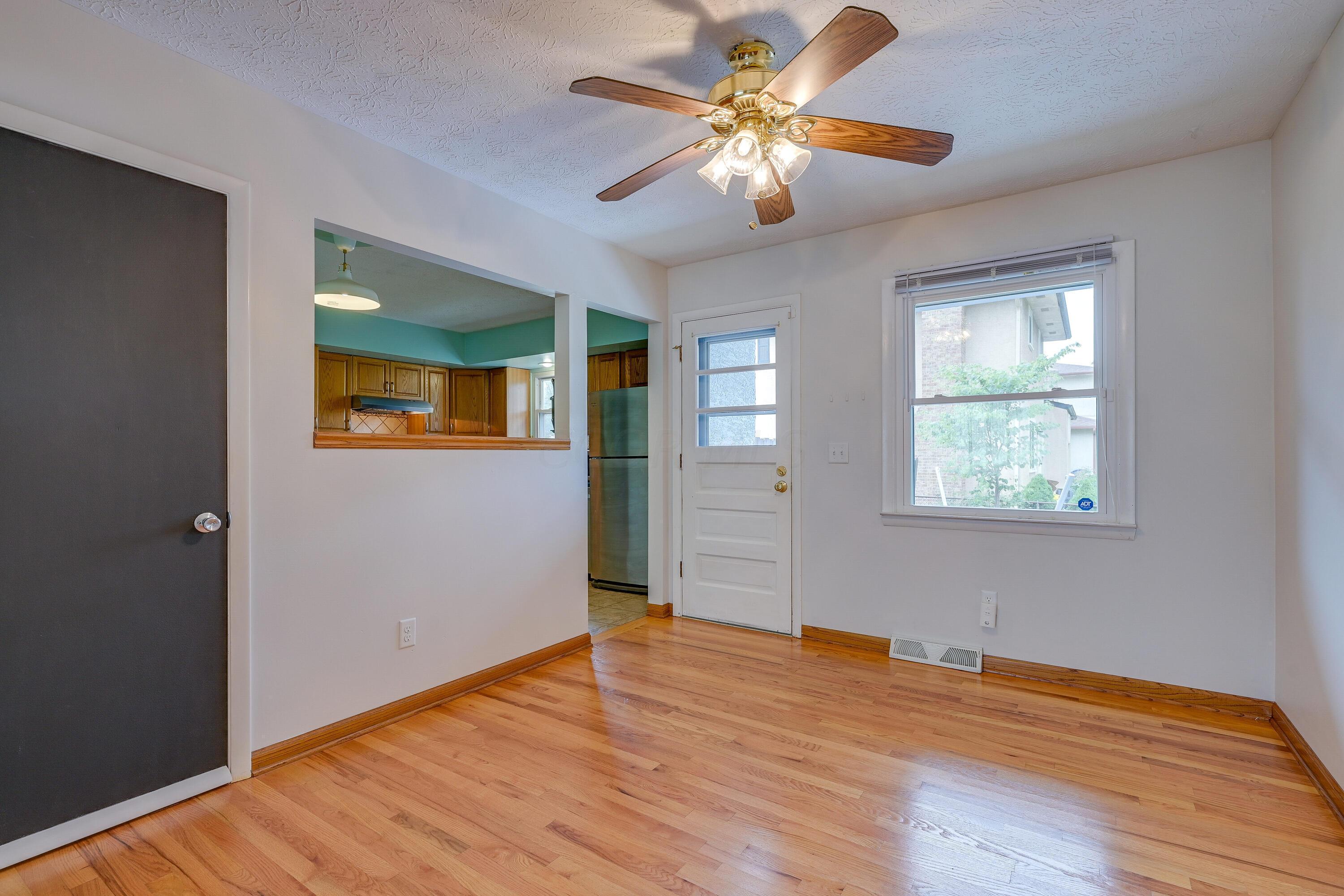 5383 Pine Bluff Road Columbus, OH 43229 - Photo 8 of 32 Dining Room with beautiful hardwood floors
