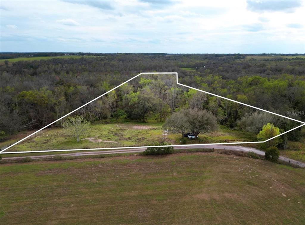 33234 Chipco Ranch Road Dade City, FL 33523 - Photo 4 of 18 a view of a tennis court