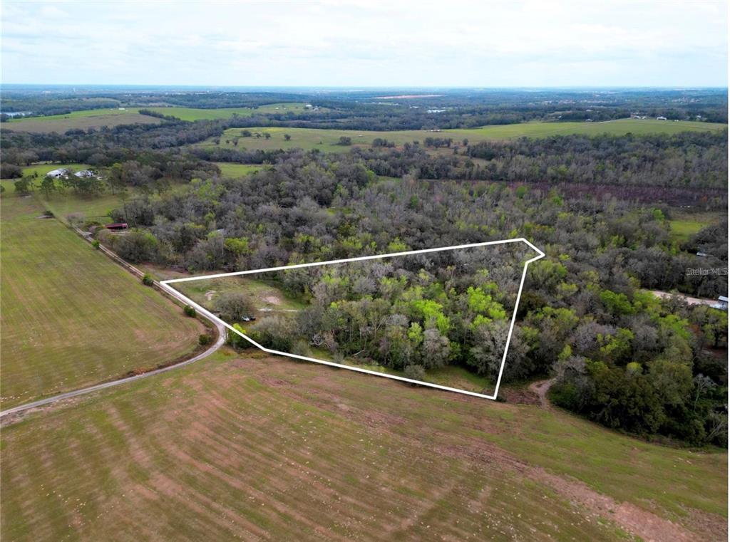 33234 Chipco Ranch Road Dade City, FL 33523 - Photo 6 of 18 an aerial view of mountain with lake view