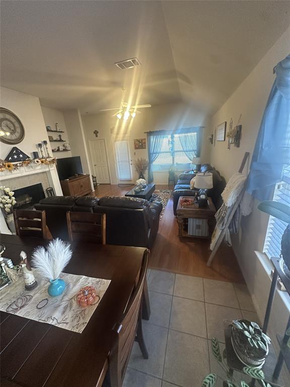715 West Milton Drive Arlington, TX 76001 - Photo 3 of 10 a living room with furniture and a dining table with kitchen view