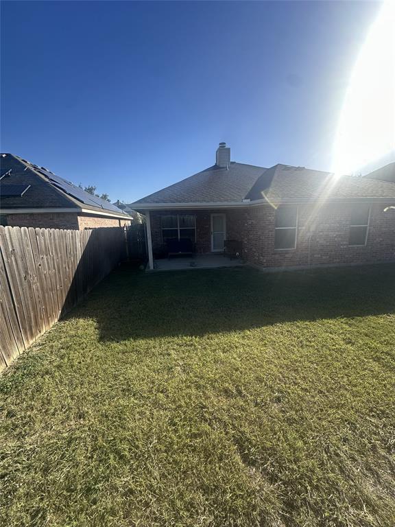 715 West Milton Drive Arlington, TX 76001 - Photo 10 of 10 a front view of a house with a yard