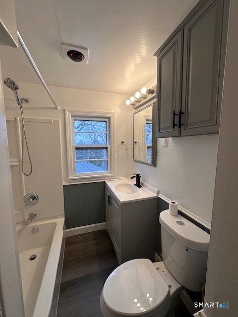 131 Ruth Street Bridgeport, CT 06606 - Photo 13 of 31 a bathroom with a sink a toilet and bathtub