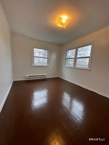a kitchen with stainless steel appliances granite countertop a stove and a microwave