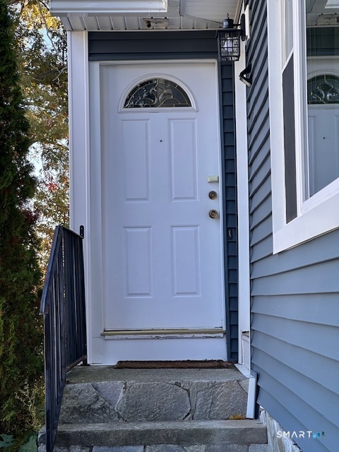 131 Ruth Street Bridgeport, CT 06606 - Photo 7 of 31 a view of front door of house